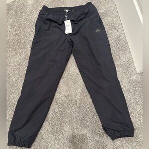 Lacoste water resistant soccer dad pants size medium NWT